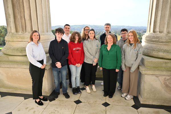 This is a group photo taken on the balcony at Parliament Buildings Stormont. The group includes young people from Dry Arch Childrens Centre who are members of Be Cyber Safe NI along with staff from the NSPCC, CiNI CEO and CiNI Head of Policy. 