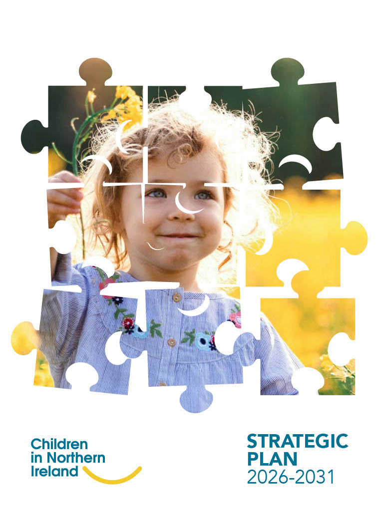 Front cover of CiNI Strategic Plan. It shows jigsaw puzzle pieces and inside the puzzle is an image of a young girl standing in a field