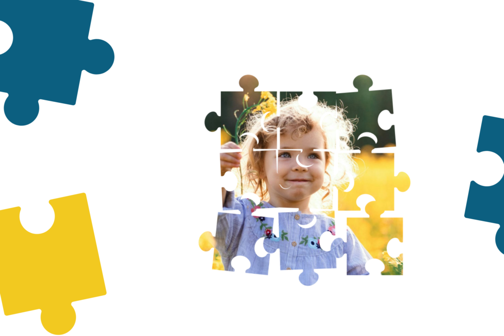 Jigsaw pieces with a young girl in a field pictured inside the jigsaw pieces.
